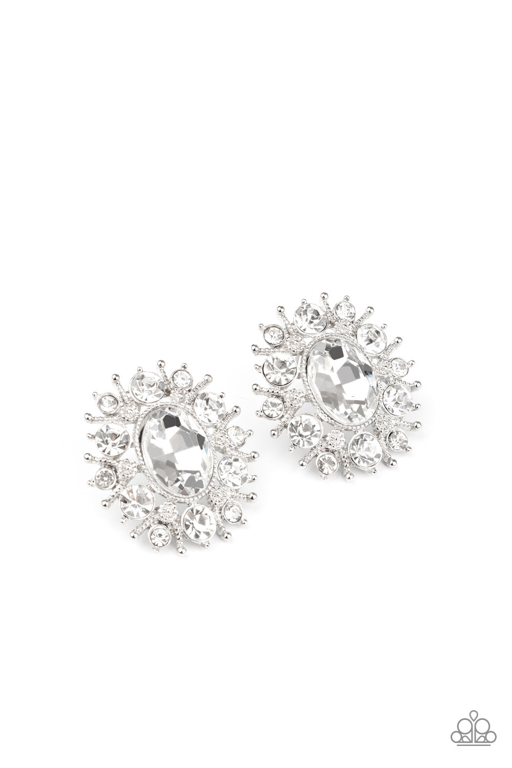 Varying in size, glittery white rhinestones and ornate silver accents burst from a dramatic white gem center for a stellar look. Earring attaches to a standard post fitting. Sold as one pair of post earrings.