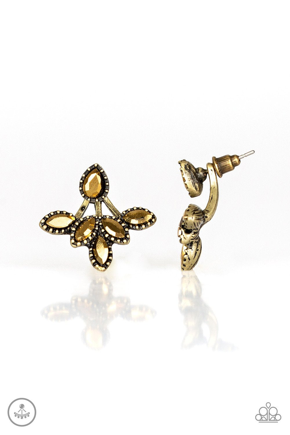 A solitaire teardrop aurum rhinestone attaches to a double-sided post, designed to fasten behind the ear. Encrusted in matching aurum rhinestones, a double-sided post peeks out beneath the ear, creating a glittery fringe. Earring attaches to a standard post fitting. Sold as one pair of double-sided post earrings.