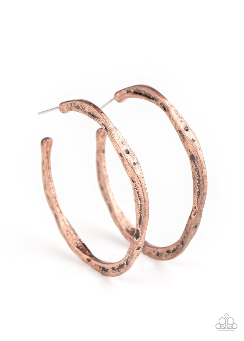 Delicately hammered in shimmery textures, a flat copper bar curls into an asymmetrical hoop for a trendy vibe. Hoop measures approximately 1 1/2" in diameter. Sold as one pair of hoop earrings.