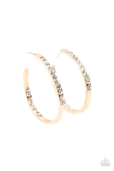The front and inside back frame of a curvaceous gold hoop is encrusted in sections of glassy white rhinestones, creating a striking shimmer. Earring attaches to a standard post fitting. Hoop measures approximately 1 3/4” in diameter. Sold as one pair of hoop earrings.