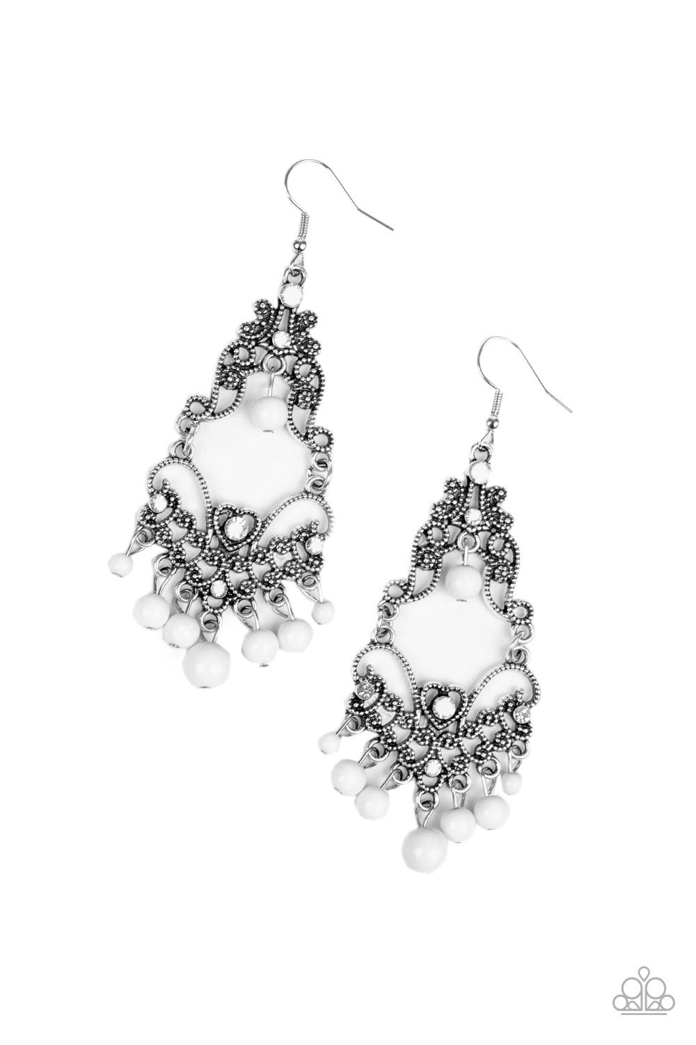 Infused with hints of glittery white rhinestones, dotted silver filigree swirls into a decorative frame. Polished white beads swing from the bottom and top of the ornate frame, adding colorful movement to the whimsical piece. Earring attaches to a standard fishhook fitting.
Sold as one pair of earrings.