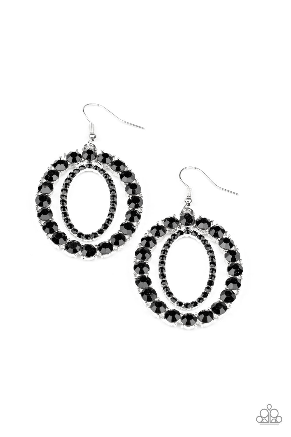 An oversized ring of glittery black rhinestones encircle a dainty ring of black rhinestones, stacking into a blinding frame. Earring attaches to a standard fishhook fitting. Sold as one pair of earrings.