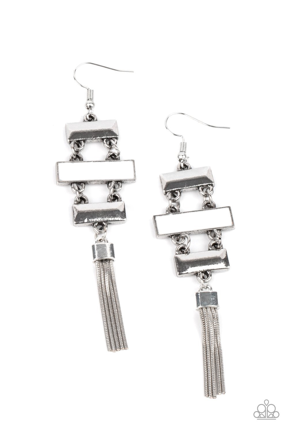 Glistening silver rectangular frames link with a white rectangular frame, connecting into a sleekly stacked lure. A shimmery silver tassel dances from the bottom, adding a hint of whimsicality to the colorful display. Earring attaches to a standard fishhook fitting. Sold as one pair of earrings.
