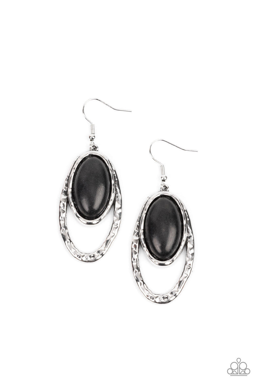 An oval black stone is pressed into a hammered silver fitting that attaches to the top of a hammered silver oval frame, creating a rustic lure. Earring attaches to a standard fishhook fitting. Sold as one pair of earrings.