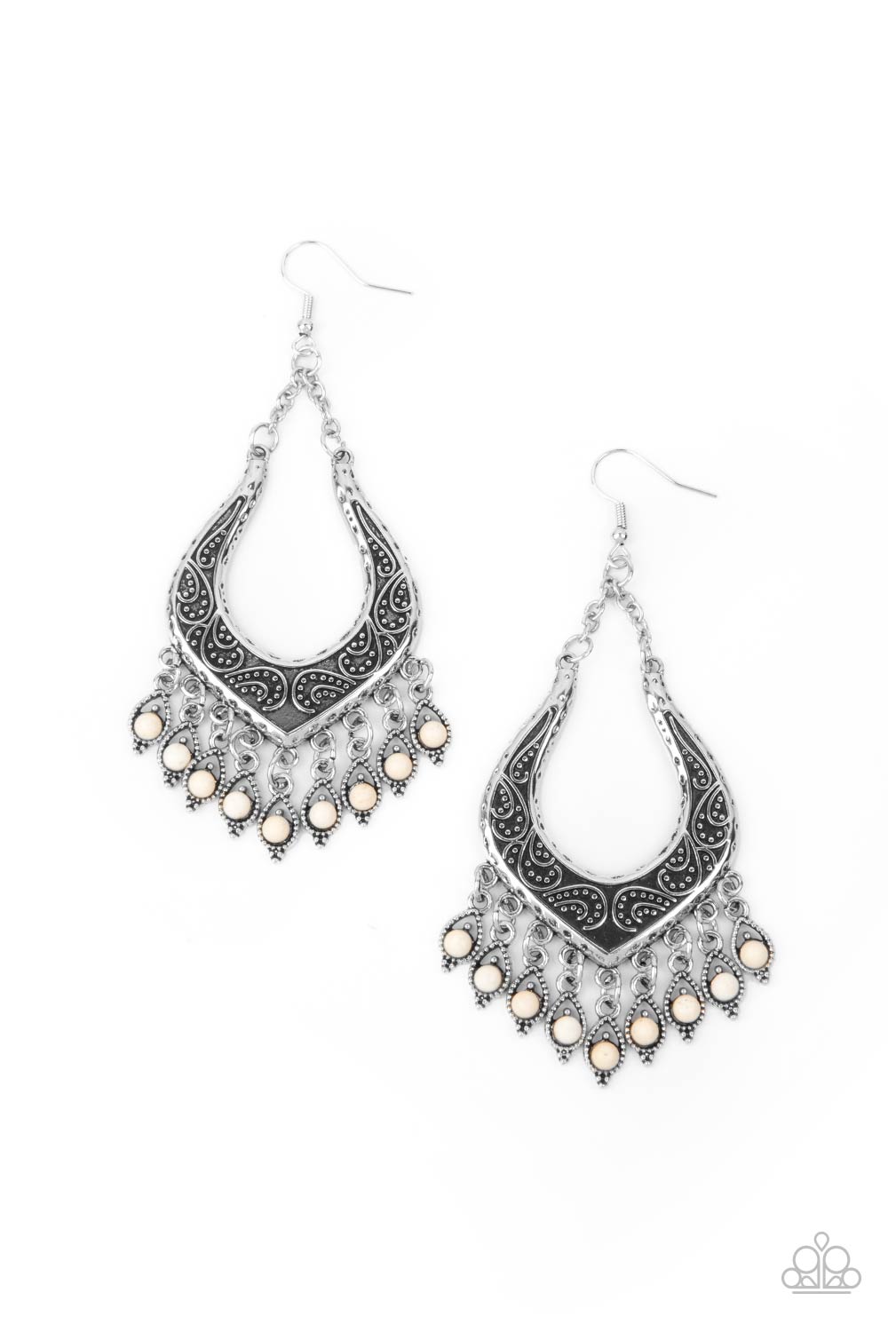 Dotted with dainty white stones, decorative silver frames swing from the bottom of an ornately studded silver frame, creating a simply seasonal fringe. Earring attaches to a standard fishhook fitting. Sold as one pair of earrings.