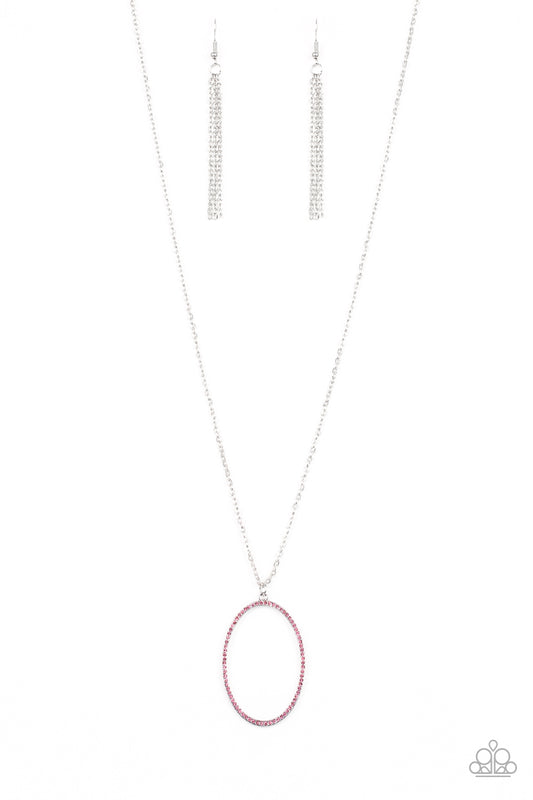 Encrusted in glassy pink rhinestones, an airy silver hoop swings from the bottom of a lengthened silver chain for a refined flair. Features an adjustable clasp closure.  Sold as one individual necklace. Includes one pair of silver fringe earrings.