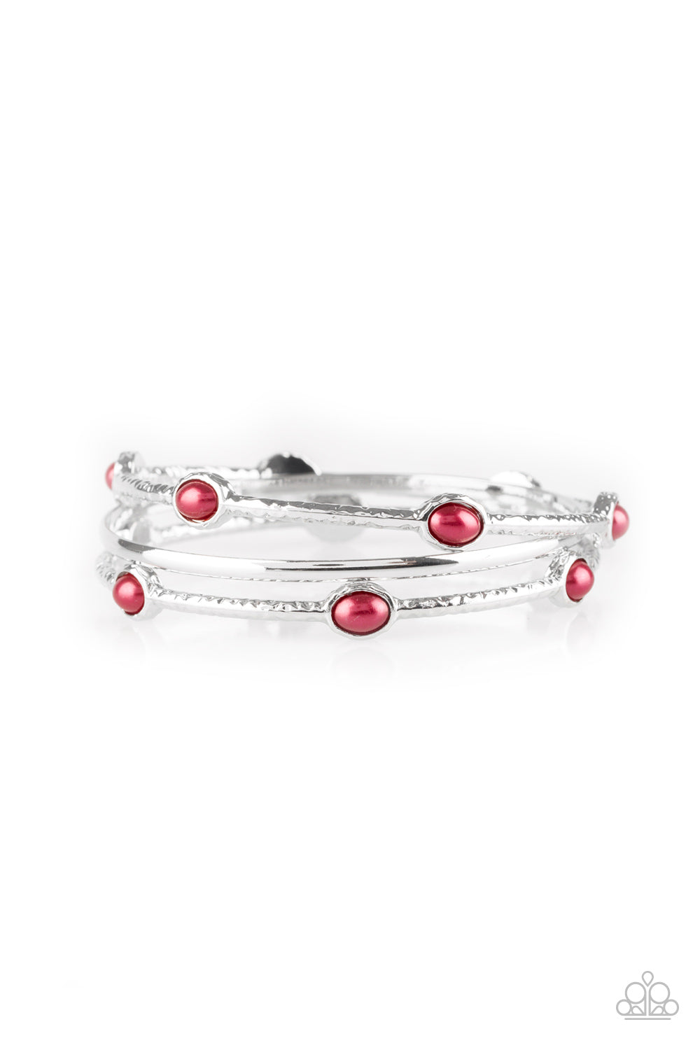 Delicately hammered in shimmer, a pair of pearly red encrusted bangles joins a smooth silver bangle around the wrist for a refined fashion. Sold as one set of three bracelets.