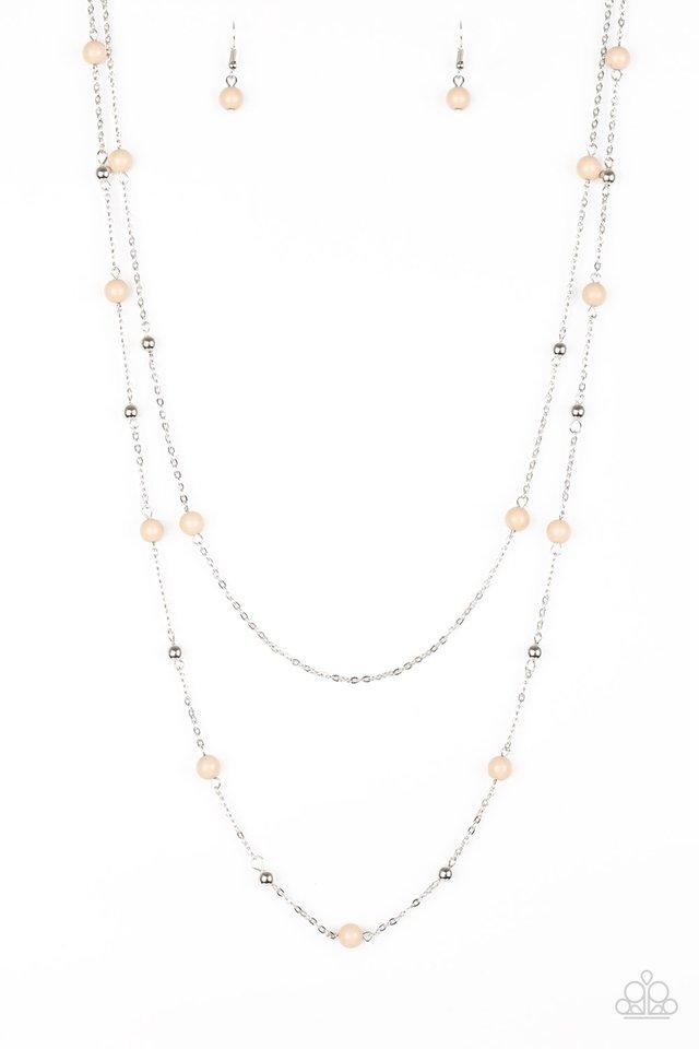 Neutral brown and dainty silver beads trickle along two shimmery silver chains, creating colorful layers down the chest. Features an adjustable clasp closure. Sold as one individual necklace. Includes one pair of matching earrings.
