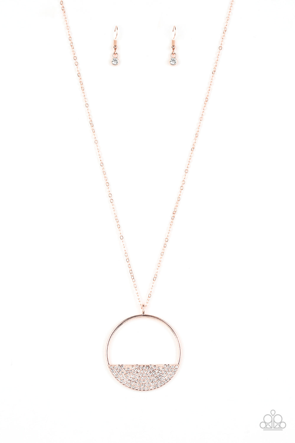 Encrusted in dainty white rhinestones, a rose gold crescent frame is pressed into the bottom of an airy circular pendant for a timeless look. Features an adjustable clasp closure. Sold as one individual necklace. Includes one pair of matching earrings.