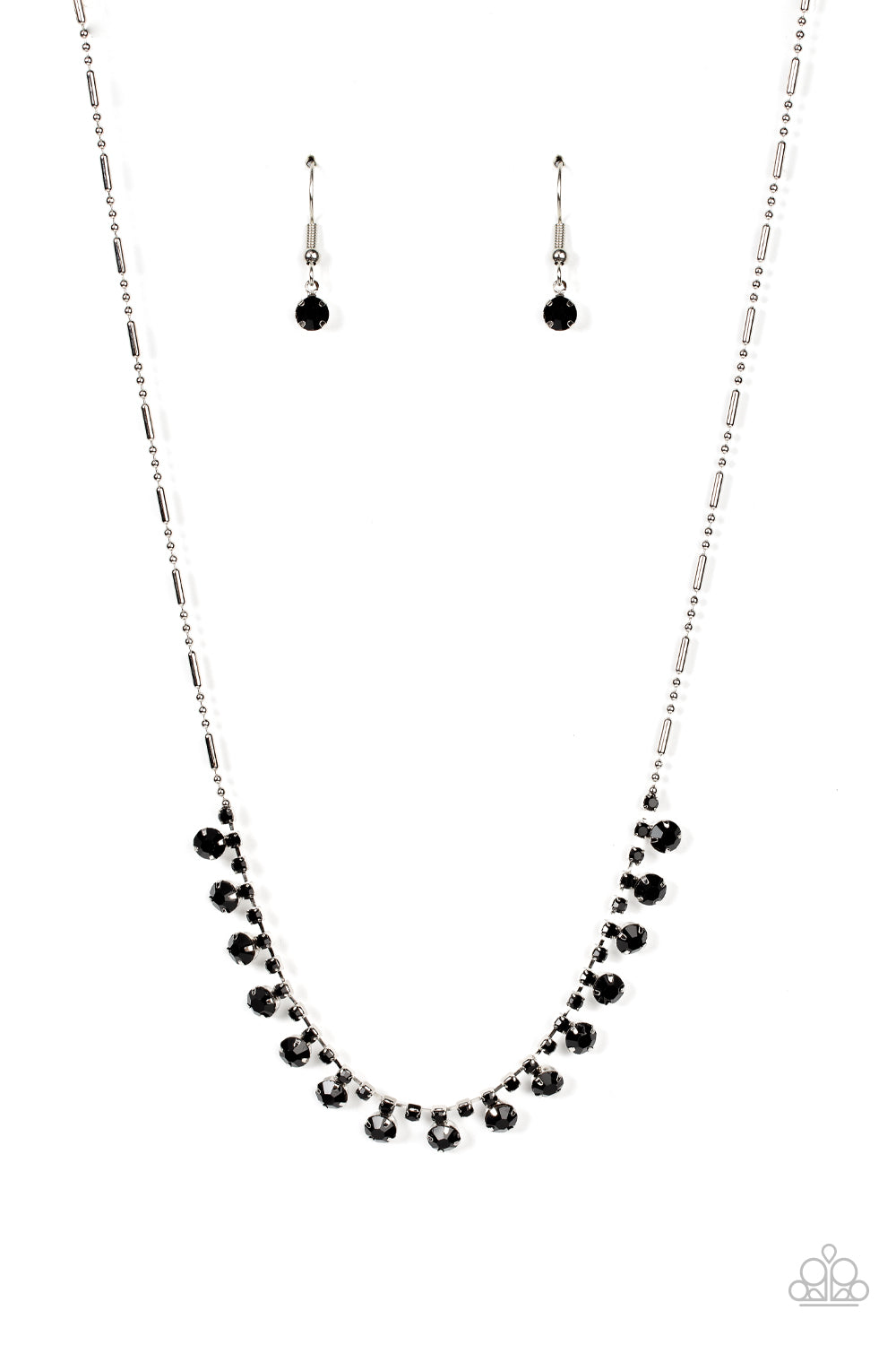 A glittery row of glassy black rhinestones dances from the bottom of a dainty strand of black rhinestones below the collar, creating a mic-dropping dazzle. Features an adjustable clasp closure. Sold as one individual necklace. Includes one pair of matching earrings.