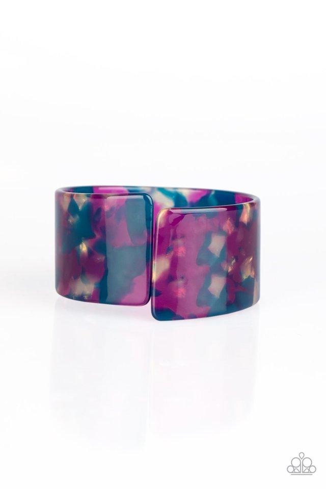 Smudged in blue and purple, an iridescent acrylic cuff asymmetrically wraps around the wrist, creating a tilted opening for a retro finish. Sold as one individual bracelet.