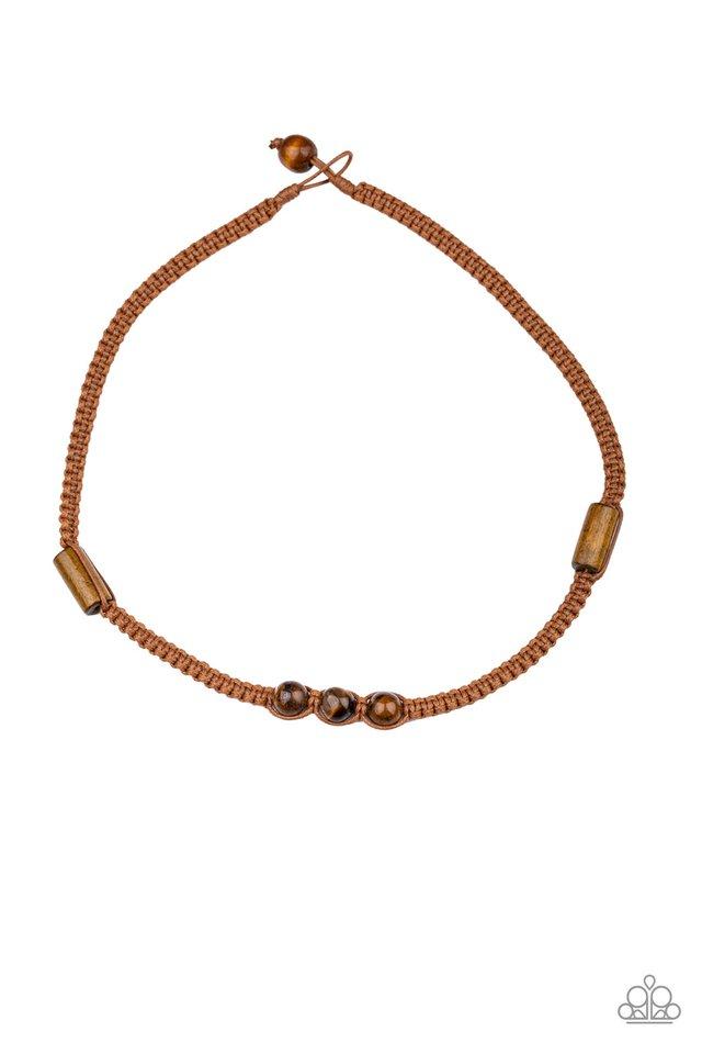 An assortment of wooden accents and glassy brown beads are knotted in place along a braided cord, creating a seasonal look below the collar. Features a button loop closure. Sold as one individual necklace.