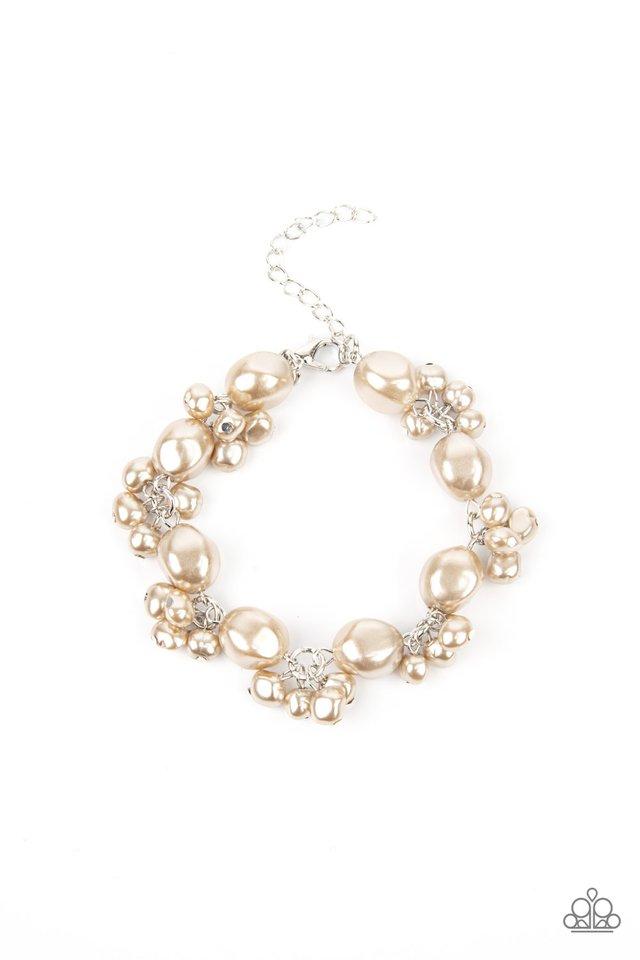 Featuring imperfect finishes, clusters of dainty pearly brown beads and pearly faceted brown beads delicately link around the wrist, creating a timeless fringe. Features an adjustable clasp closure. Sold as one individual bracelet.