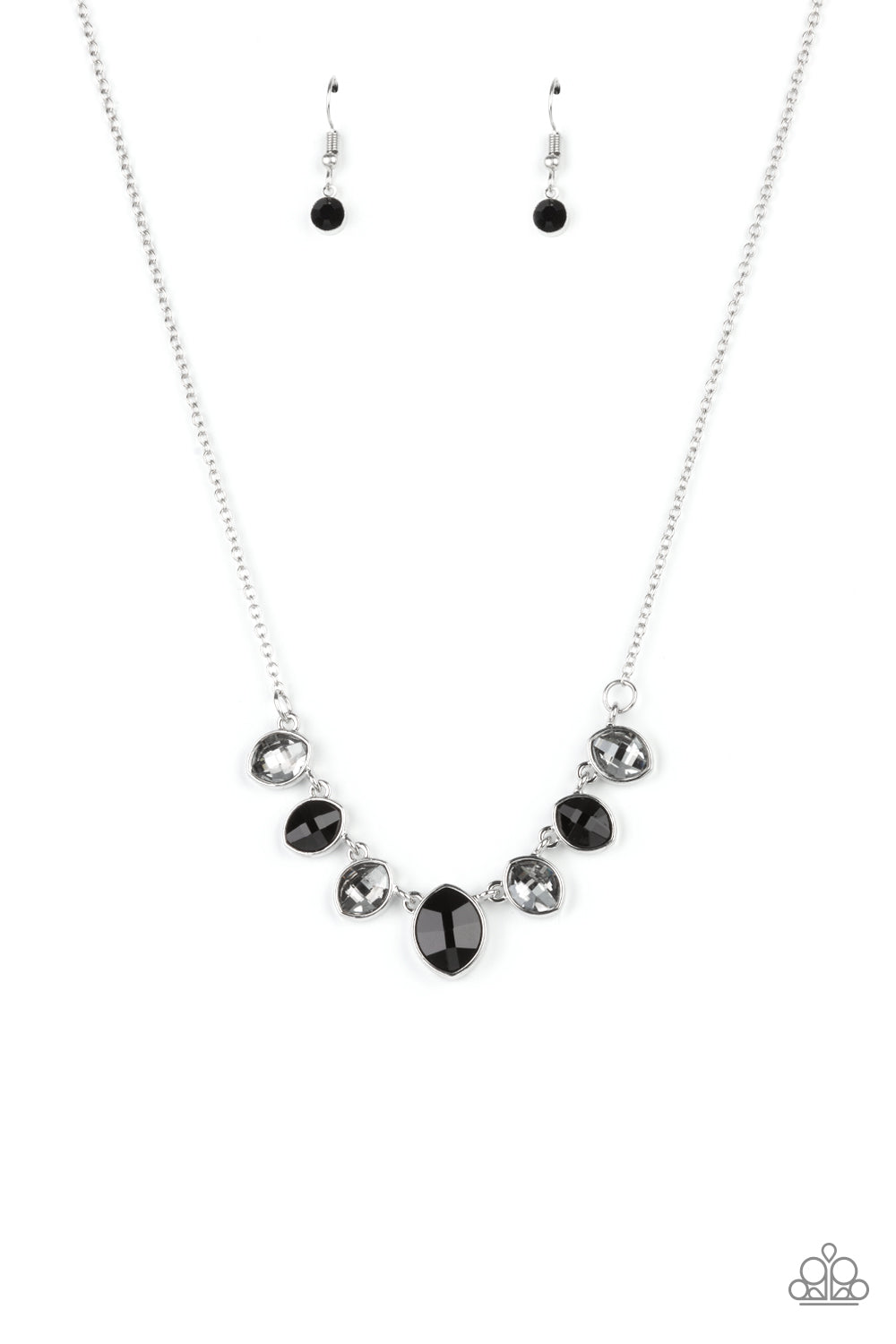 Encased in sleek silver fittings, elegant cut smoky and black rhinestones delicately connect below the collar. An oversized black rhinestone adorns to the middle of the glittery strand, creating a sparkly centerpiece. Features an adjustable clasp closure. Sold as one individual necklace. Includes one pair of matching earrings.