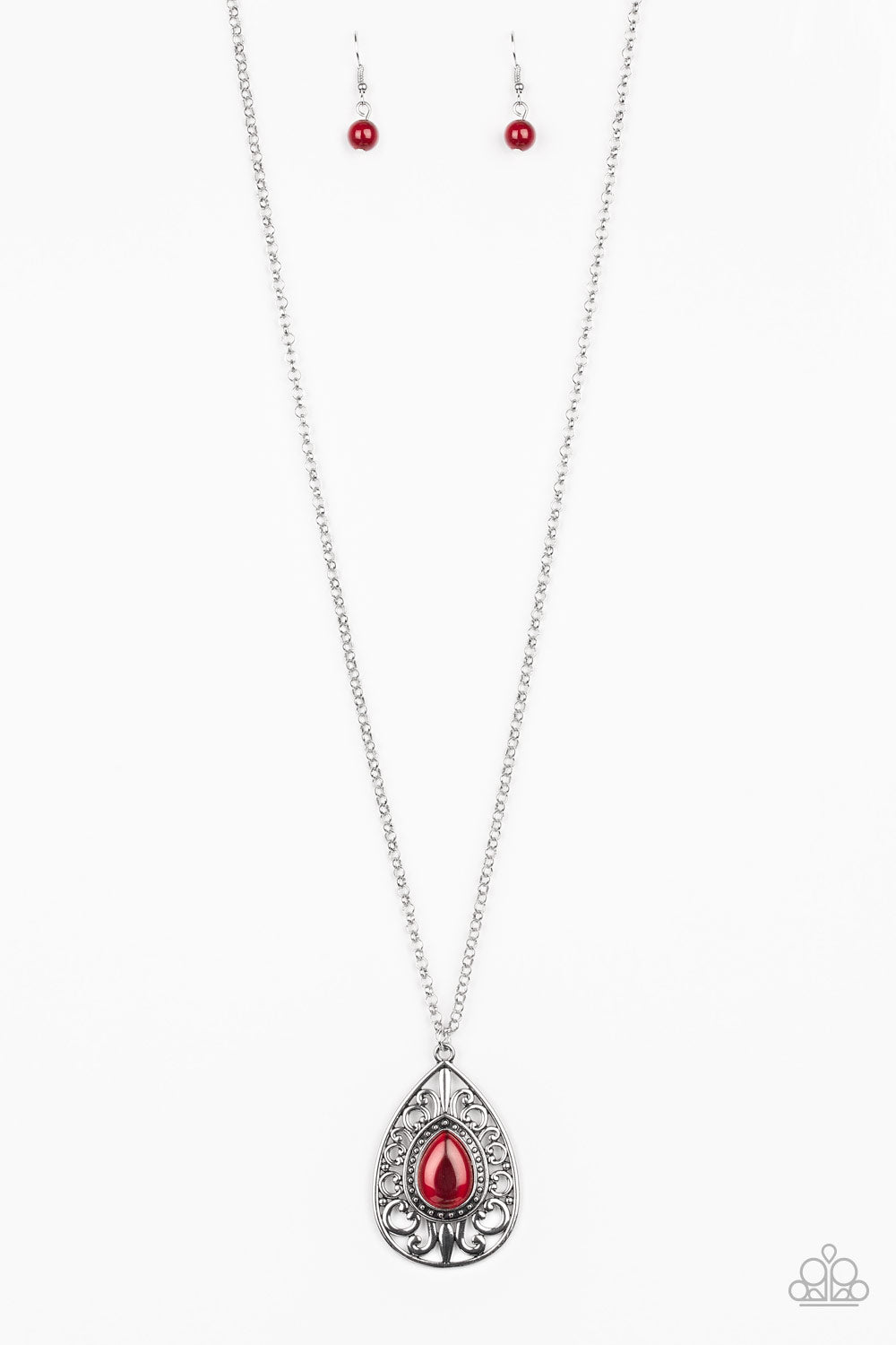 A glowing red moonstone is pressed into the center of a silver teardrop pendant swirling with regal filigree for a regal finish. Features an adjustable clasp closure. Sold as one individual necklace. Includes one pair of matching earrings.