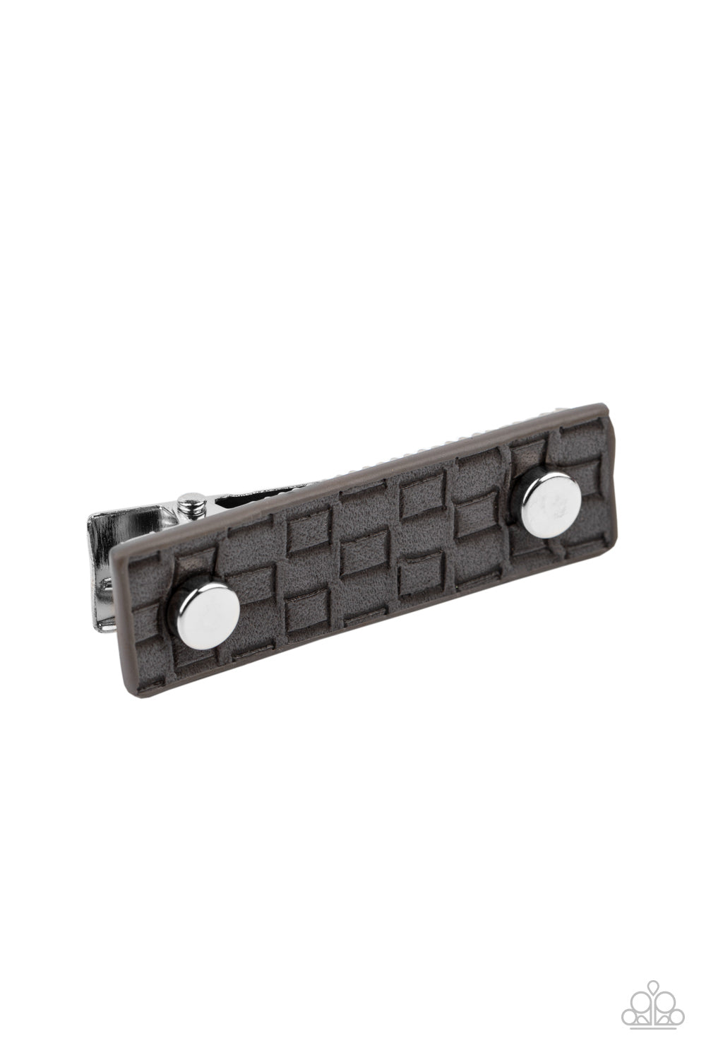 Dotted with two silver studs, a piece of gray leather that is embossed in an edgy geometric pattern adorns the front of a rectangular silver frame, creating a retro display. Features a standard hair clip on the back. Sold as one individual hair clip.