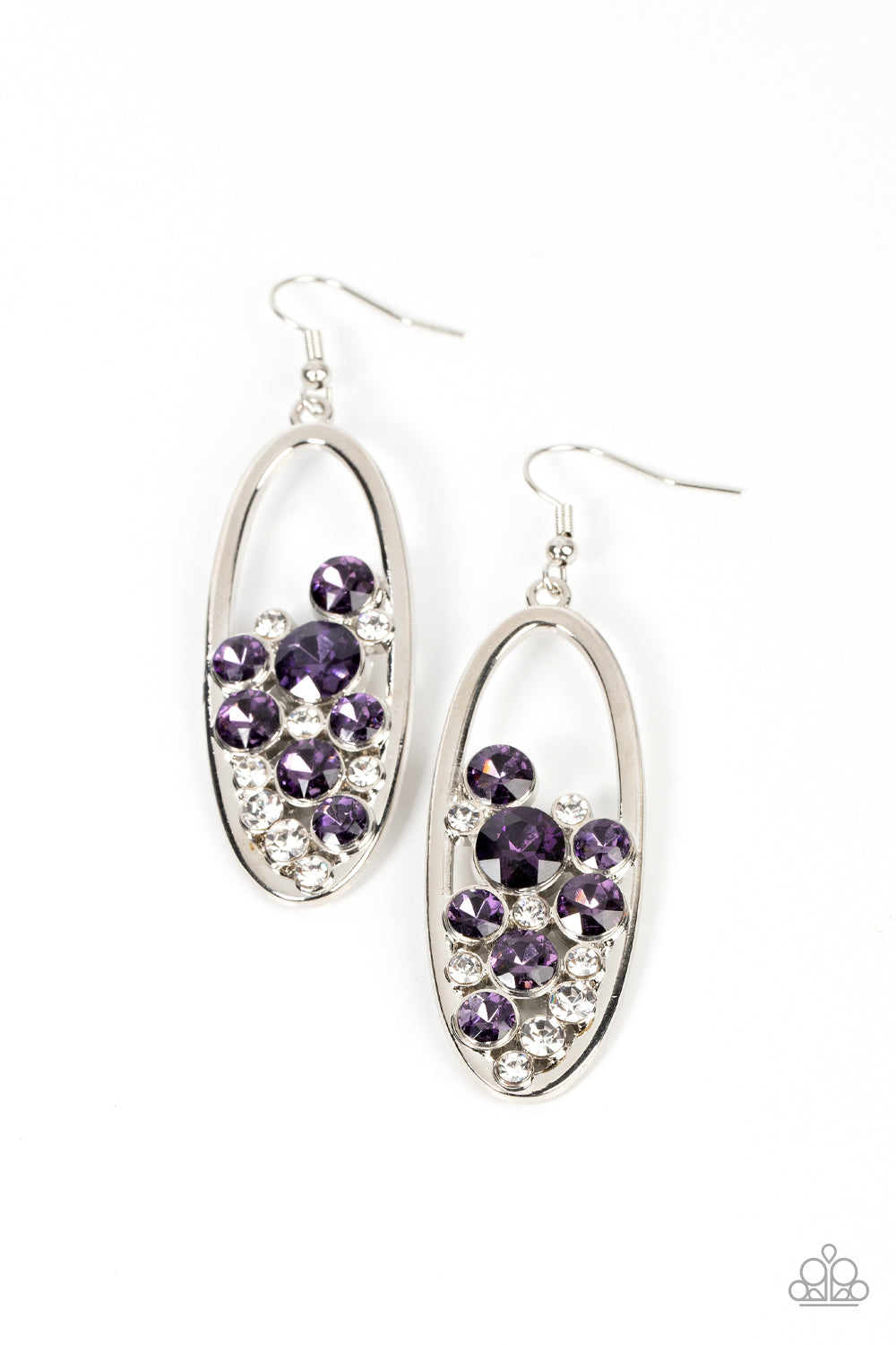 Effervescent stacks of sparkly white and purple rhinestones bubble up inside a simple silver oval frame creating a prismatically stunning lure. Earring attaches to a standard fishhook fitting. Sold as one pair of earrings.