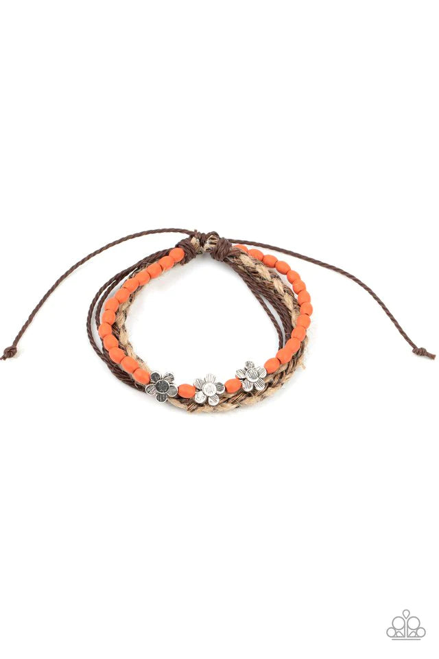 Three delightful etched silver flowers stand out on a strand of orange wooden beads. Paired with an assortment of braided twine and cording, the set wraps around the wrist for an earthy remix. Features an adjustable sliding knot closure. Sold as one individual bracelet.