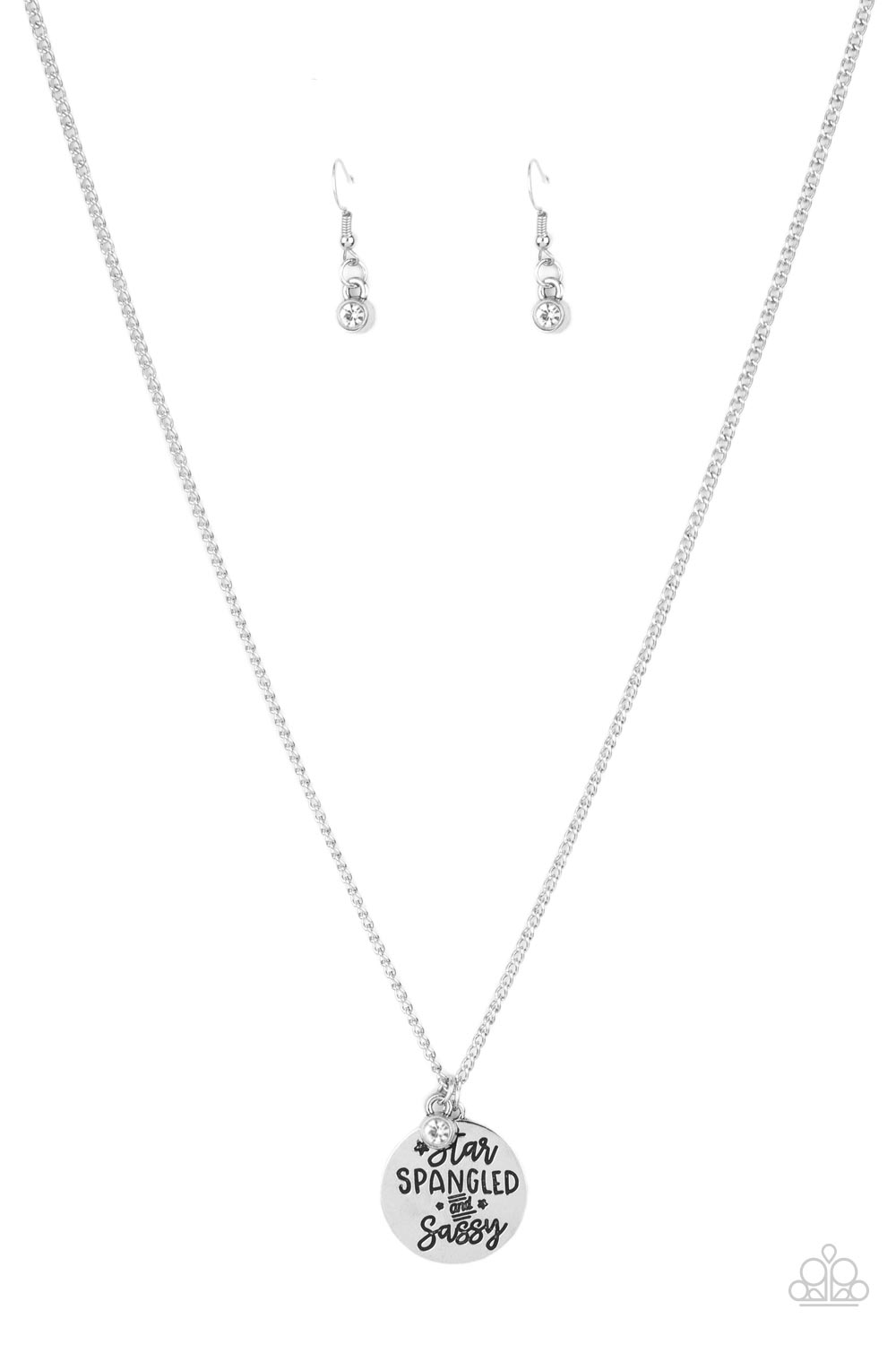 Infused with a solitaire white rhinestone, a shiny silver disc is stamped in the patriotic phrase, "Star Spangled and Sassy," as is glides along a lengthened silver chain for a sassy finish. Features an adjustable clasp closure. Sold as one individual necklace. Includes one pair of matching earrings.