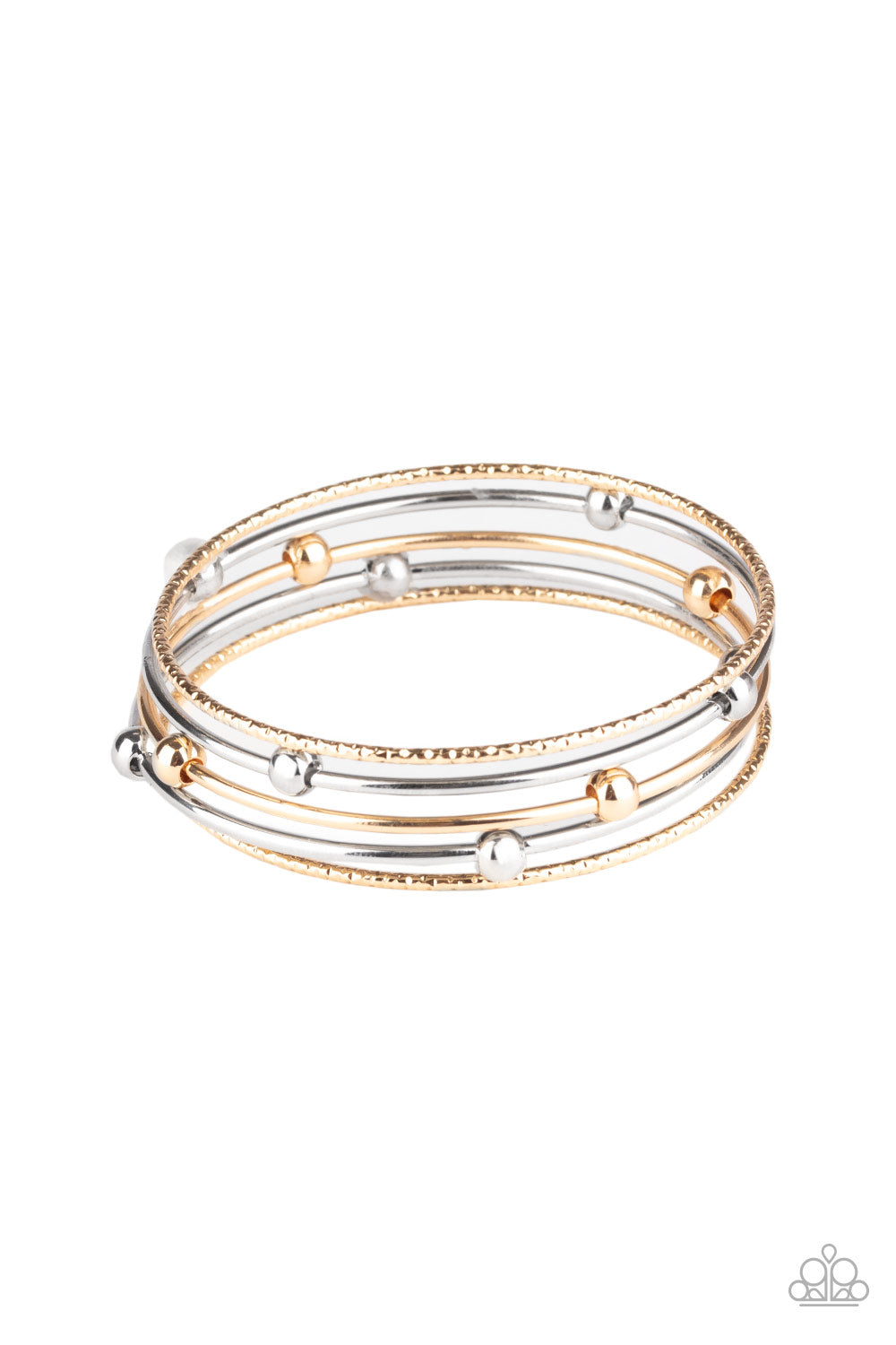 A pair of delicately hammered gold bangles joins a trio of silver and gold beaded bangles around the wrist, creating a collision of metallic texture. Sold as one set of five bracelets.