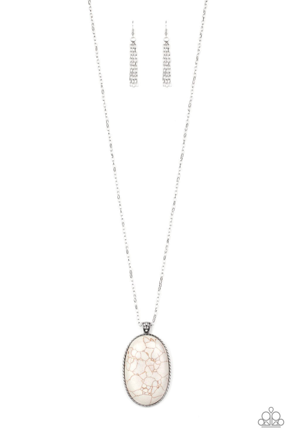 Chiseled into a tranquil oval, a dramatically oversized white stone pendant swings from the bottom of a lengthened silver chain. Glassy white rhinestones dust the pendant's fitting for a refined flair. Features an adjustable clasp closure.
Sold as one individual necklace. Includes one pair of matching earrings.