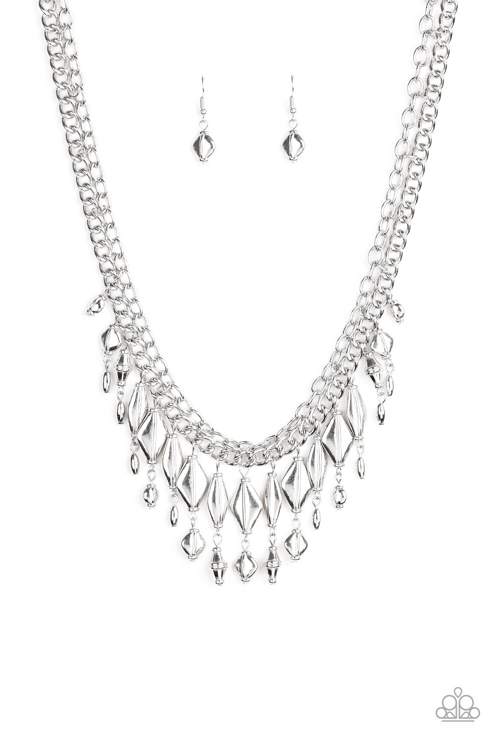 A mismatched collection of silver beaded tassels dangle from the bottom of two interconnecting silver chains, creating a noisy fringe below the collar. Features an adjustable clasp closure. Sold as one individual necklace. Includes one pair of matching earrings.