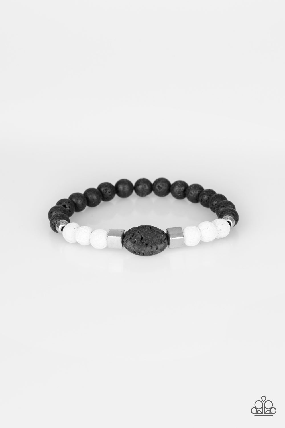 A collection of silver beads, black lava rock, and white lava rock beads are threaded along a stretchy band around the wrist for a seasonal look. Sold as one individual bracelet.