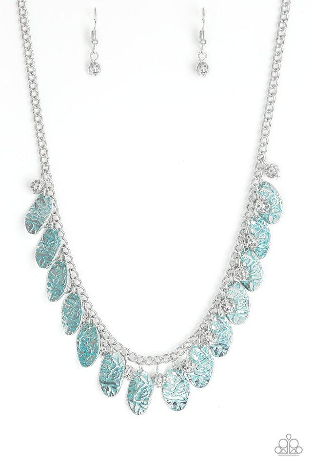 Brushed in a patina finish, floral embossed silver frames swing from a silver chain. Infused with ornate silver beads, the whimsical fringe falls just below the collar for a vintage inspired look. Features an adjustable clasp closure. Sold as one individual necklace. Includes one pair of matching earrings.
