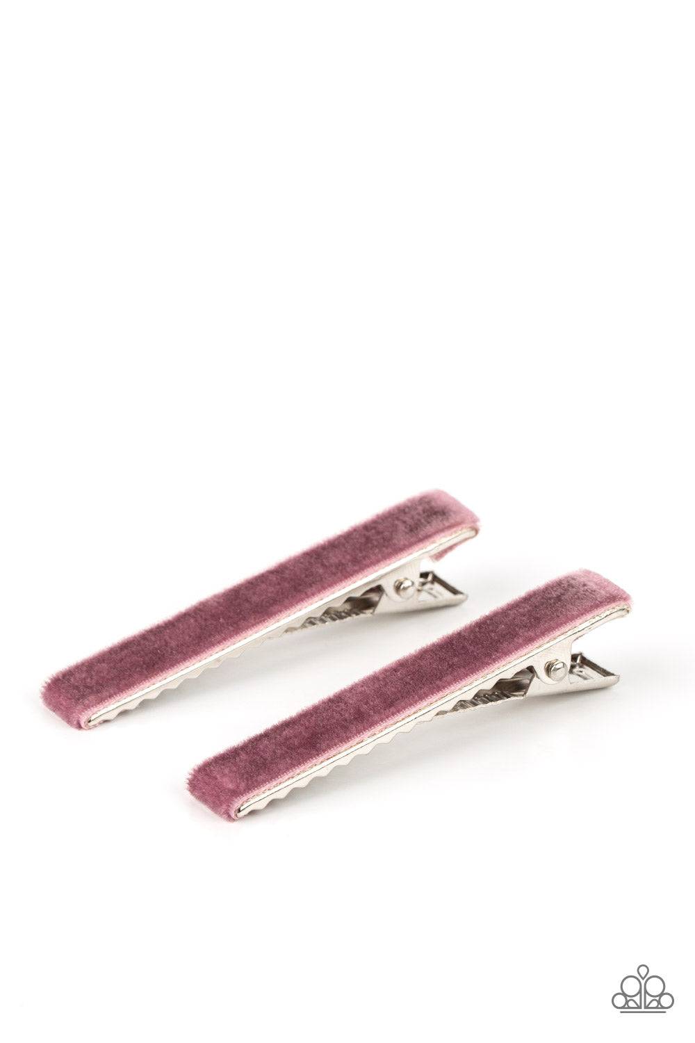 A pair of rectangular frames are covered in pieces of purple velvet, creating a vintage inspired look. Features standard hair clips on the back. Sold as one pair of hair clips.