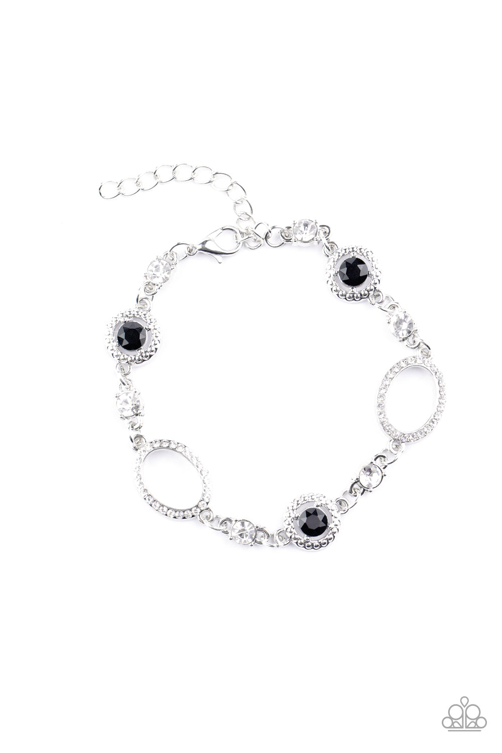 Infused with classic white rhinestones, a glittery collection of white rhinestone encrusted silver ovals and black rhinestone encrusted studded silver frames elegantly link around the wrist for a refined flair. Features an adjustable clasp closure.
Sold as one individual bracelet.
