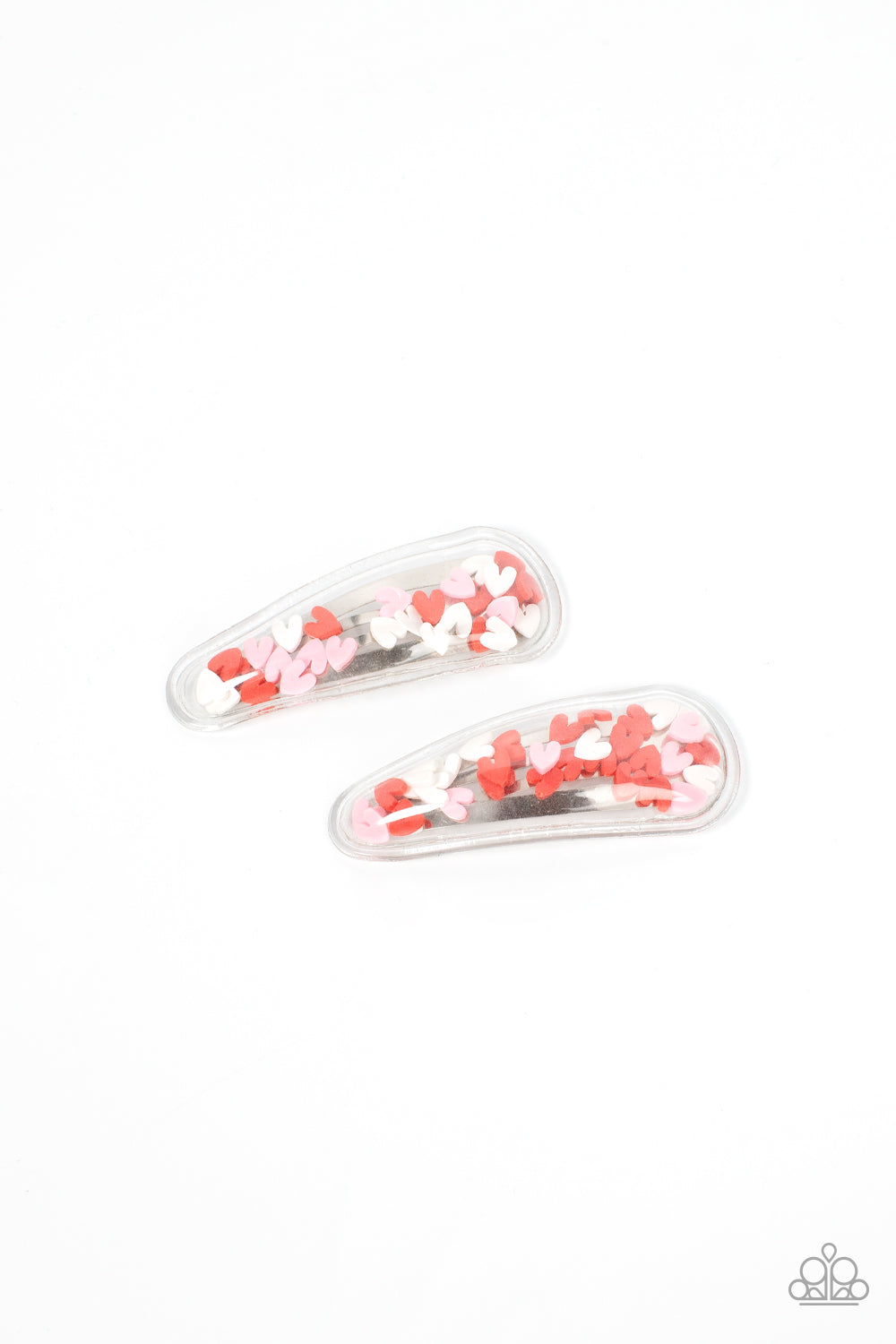 A flirtatious collection of red, white, and pink hearts flutter back and forth inside a clear plastic frame, creating a charming eye-catching pop of color. Features standard snap hair clips on the back. Sold as one pair of hair clips.