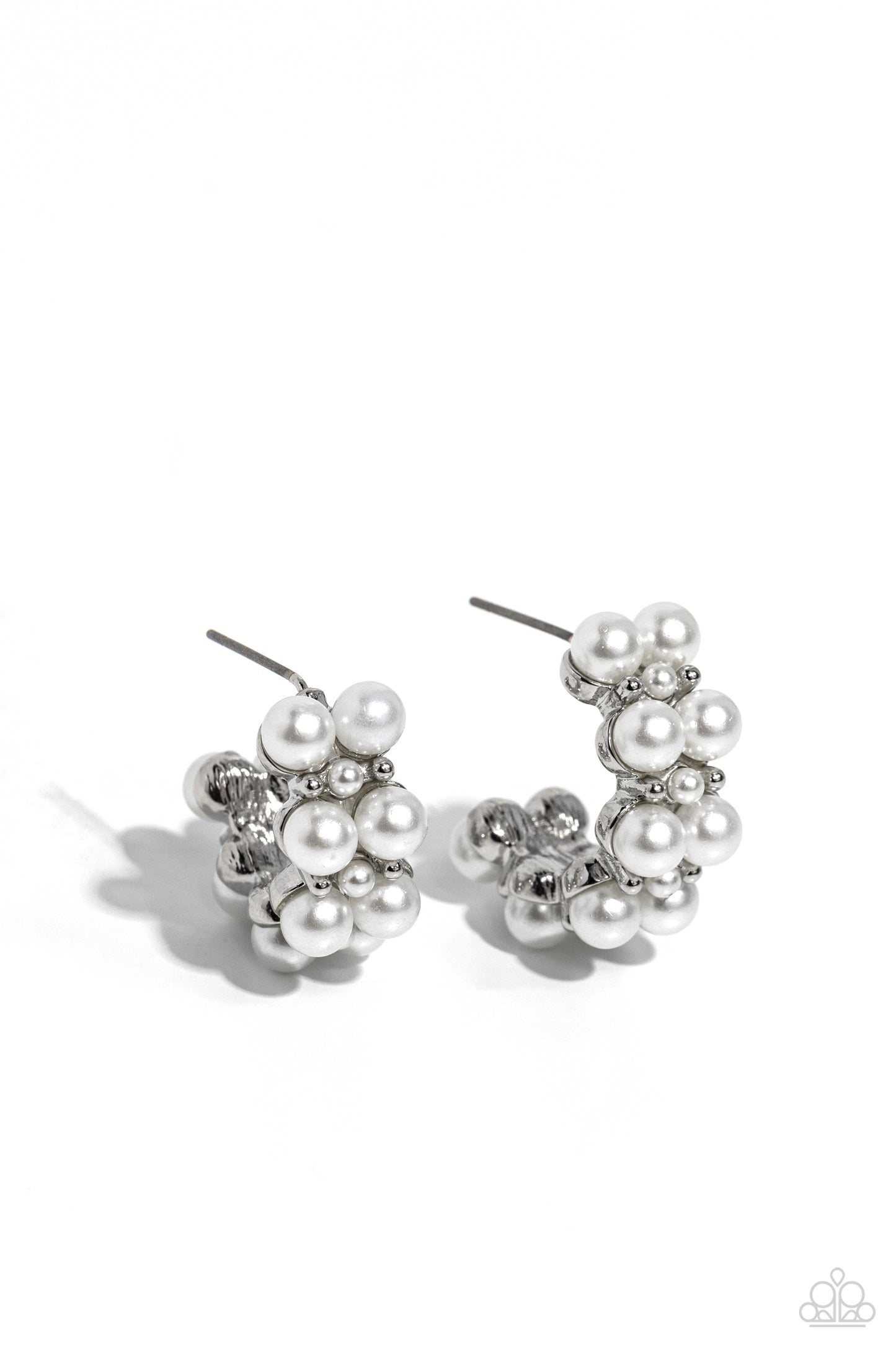 Two rows of bubbly white pearls stack and form into a scalloped pattern. Daintily curling around the ear, the bubbly effect of the high-sheen silver studs and daintier pearls separating the larger pearls creates a radiant, refined hoop. Earring attaches to a standard post fitting. Hoop measures approximately 1" in diameter. Sold as one pair of hoop earrings.