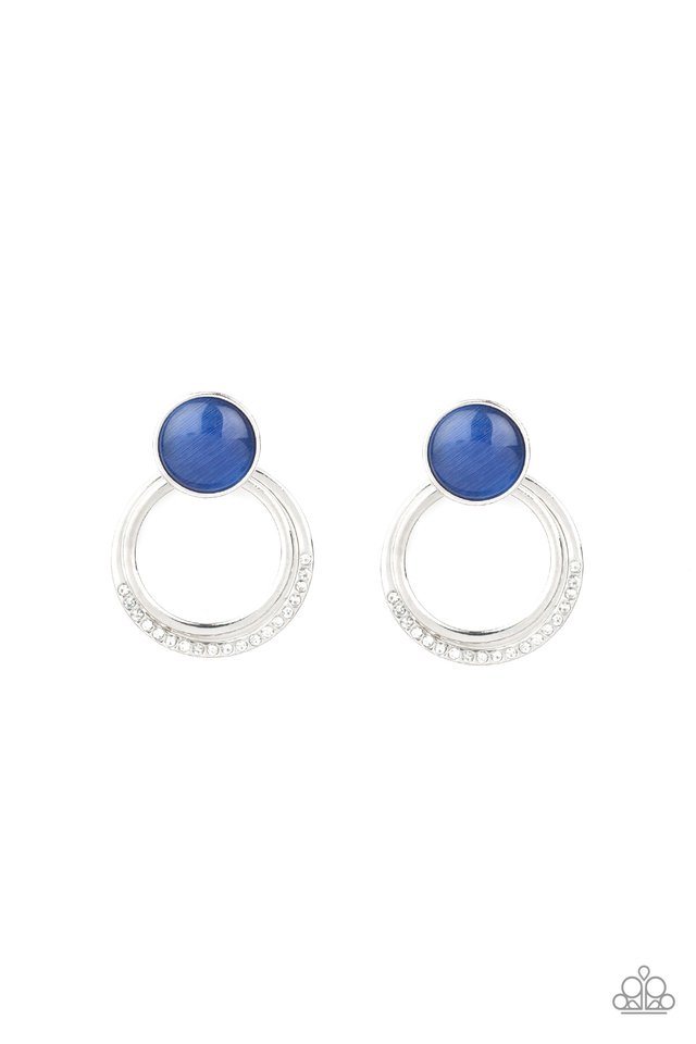 A plain silver hoop and white rhinestone encrusted hoop swing from the bottom of a glowing blue cat's eye stone fitting for a whimsical fashion. Earring attaches to a standard post fitting. Sold as one pair of post earrings.