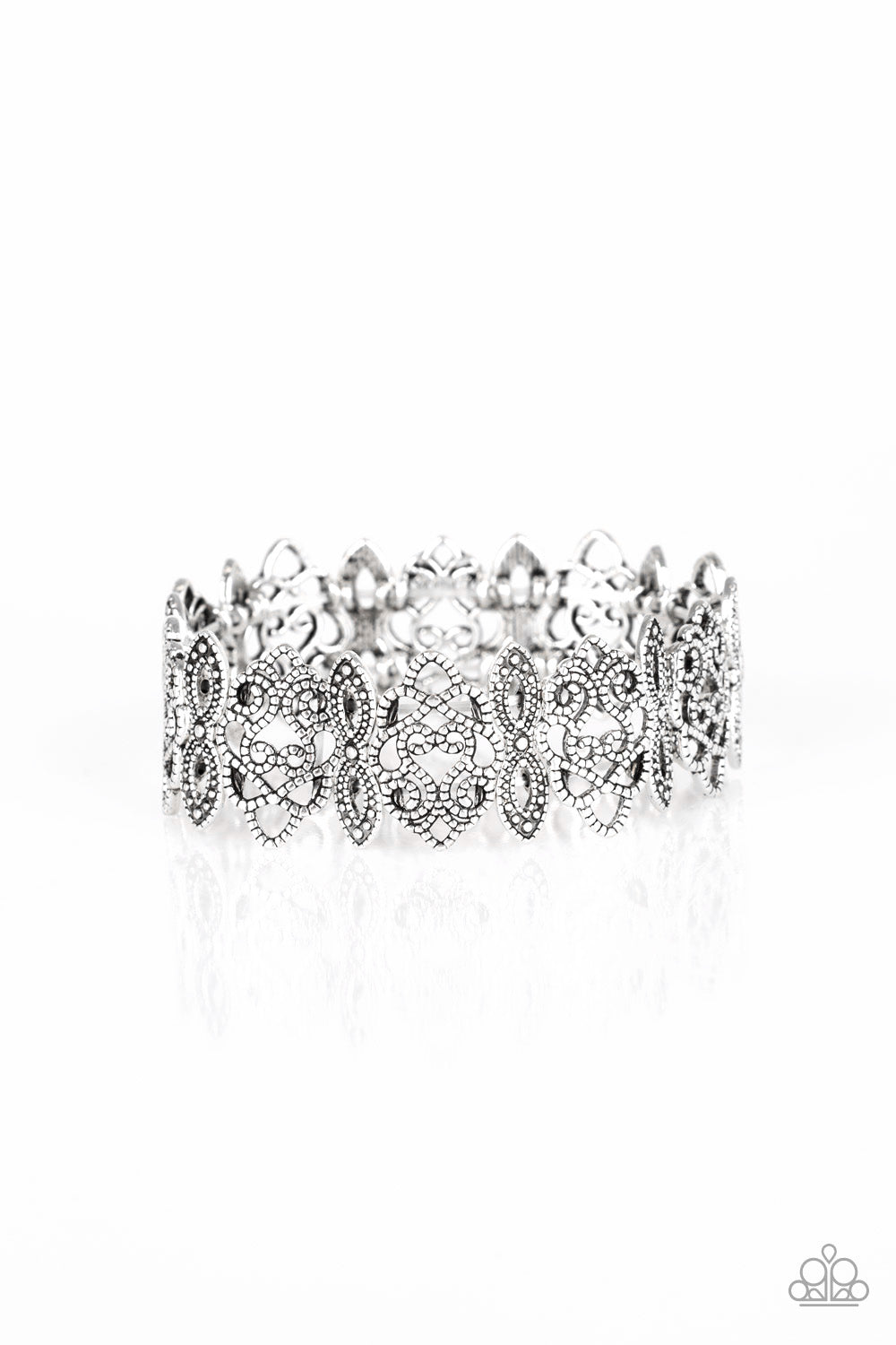 Radiating with studded detail, ornate silver filigree frames are threaded along stretchy bands around the wrist for a whimsical look. Sold as one individual bracelet.