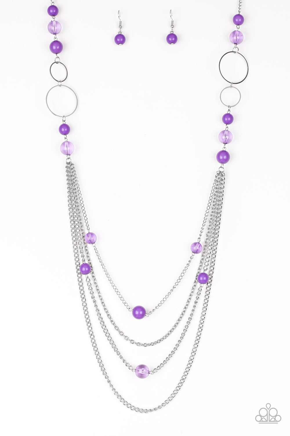 Infused with shimmery silver hoops, glassy and polished pruple beads trickle along glistening silver chains for a bubbly look. Features an adjustable clasp closure.
Sold as one individual necklace. Includes one pair of matching earrings.