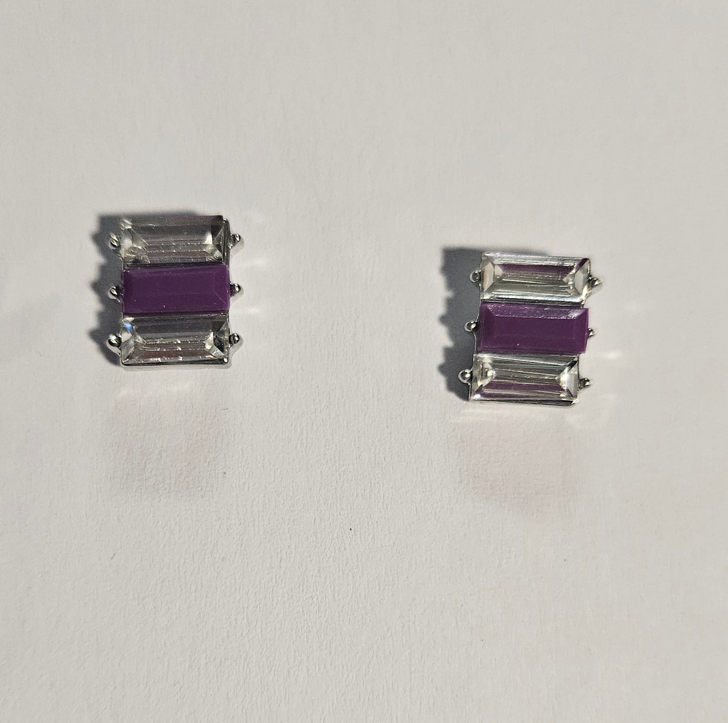 Kids' rectangle earrings with purple rectangle bead in center and clear rectangle beads on each side