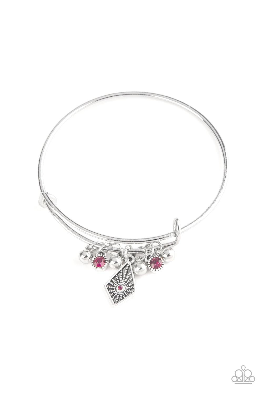 A collection of shimmery silver beads and glittery pink rhinestone accents slide along a sleek bar fitting, creating whimsical charms as they glide along the dainty silver bangle. Sold as one individual bracelet.