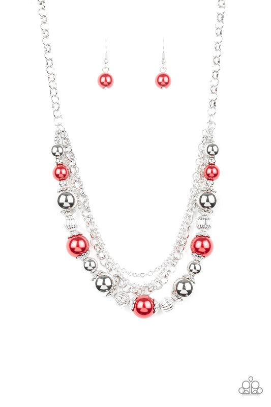 Layers of mismatched silver chains give way to a strand of ornate silver beads and oversized green pearls that cascade below the collar for a refined flair. Features an adjustable clasp closure.  Sold as one individual necklace. Includes one pair of matching earrings.