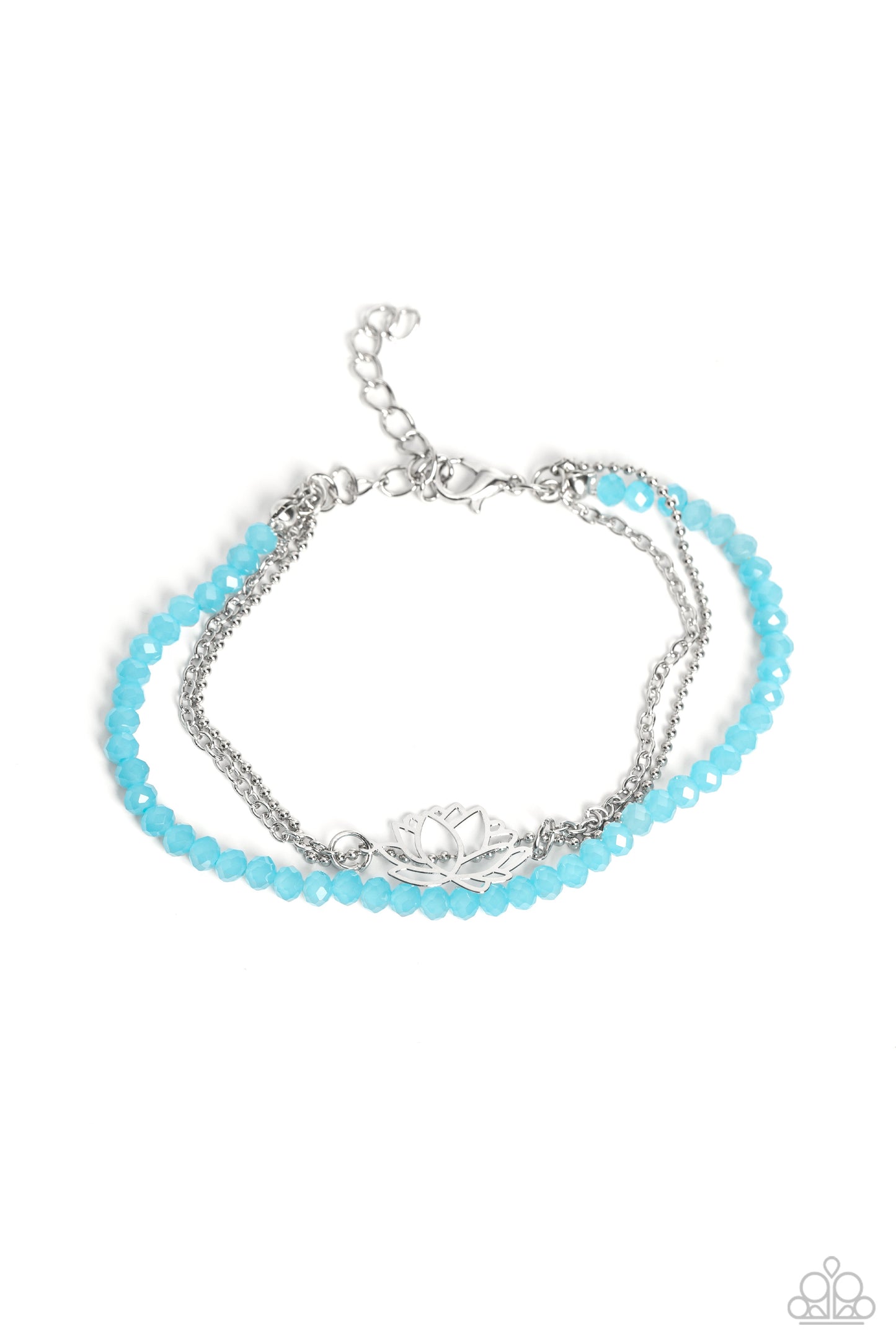 Faceted blue beads combine with a dainty silver chain, and a dainty silver ball chain for a colorful display around the wrist. Falling from the classic chain, an airy silver lotus blooms, adding a whimsical floral display to the design. Features an adjustable clasp closure. Sold as one individual bracelet.