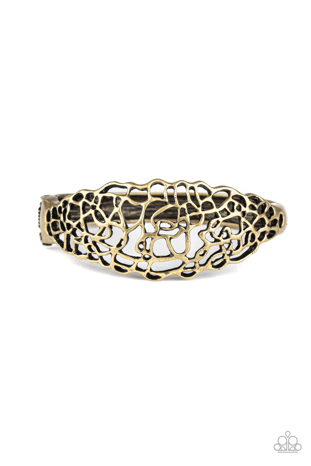 Glistening brass bars coalesce into an airy stenciled cuff-like bracelet around the wrist for a whimsical metallic look. Features a hinged closure. Sold as one individual bracelet.