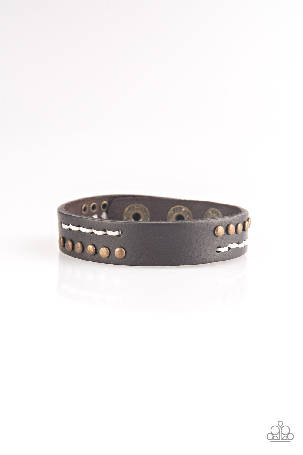 Sections of glistening gunmetal studs and stitched white thread adorns the front of a brown leather band for an adventurous look. Features an adjustable snap closure. Sold as one individual bracelet.