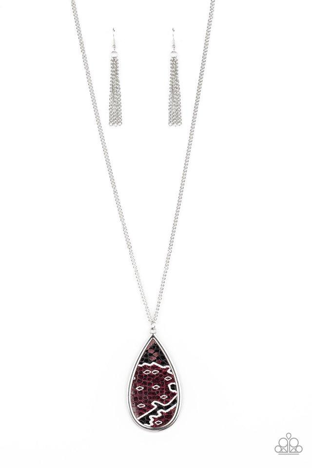 Featuring a metallic scale print, a piece of purple leather embellishes the center of an oversized silver teardrop at the bottom of a lengthened silver chain for a wild look. Features an adjustable clasp closure. Sold as one individual necklace. Includes one pair of matching earrings.