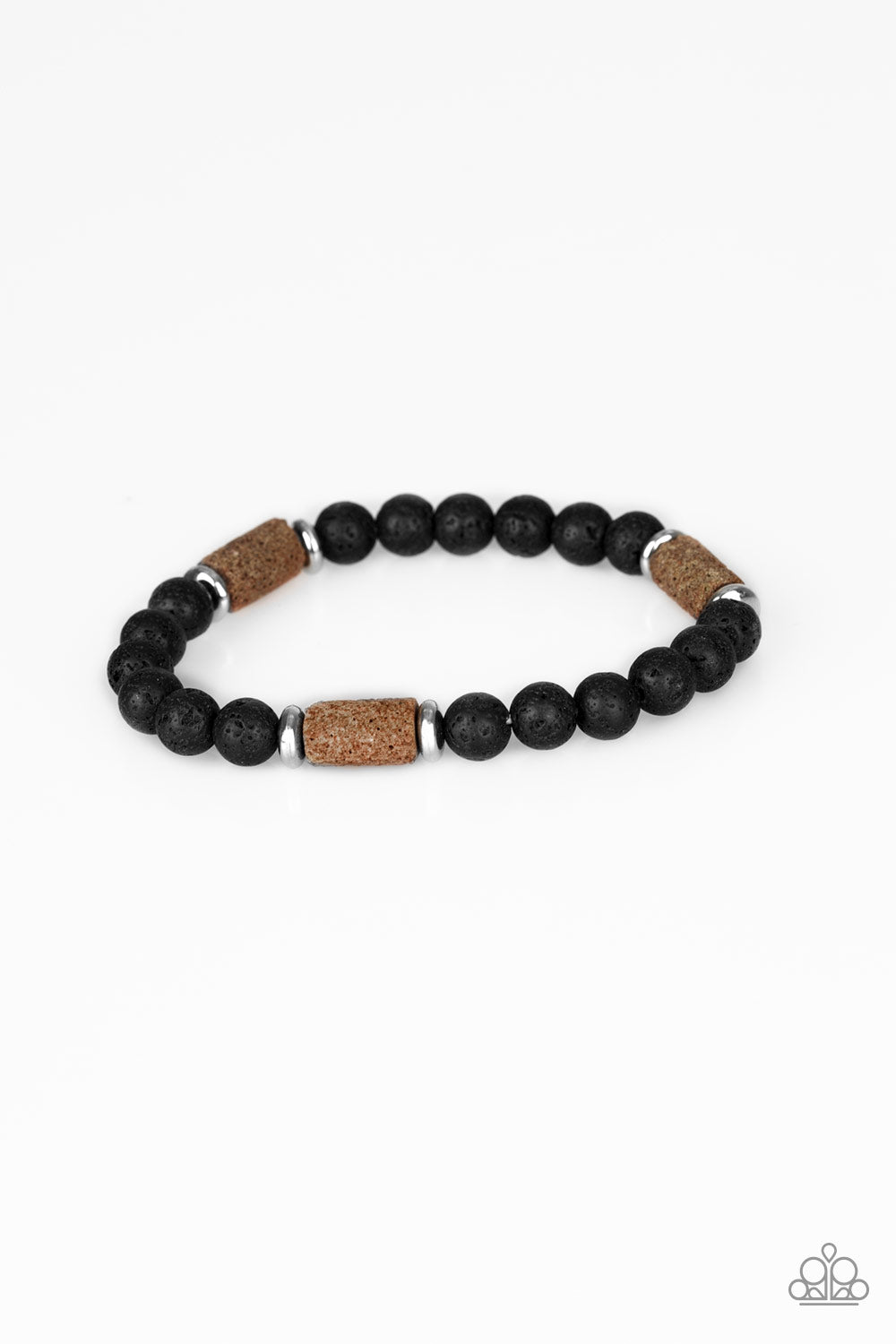 A collection of silver beads, black lava rock, and cylindrical brown lava rock beads are threaded along a stretchy band around the wrist for a seasonal look. Sold as one individual bracelet.