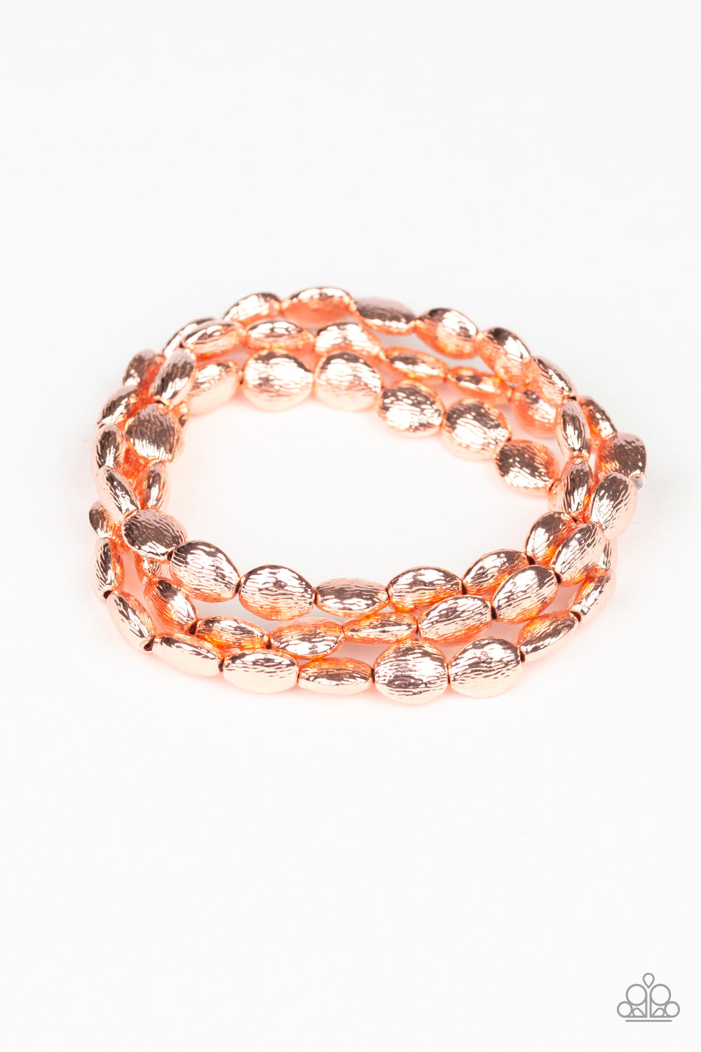Radiating with shimmery textures, dainty shiny copper beads are threaded along stretchy bands around the wrist for a casually layered look.
Sold as one set of three bracelets.