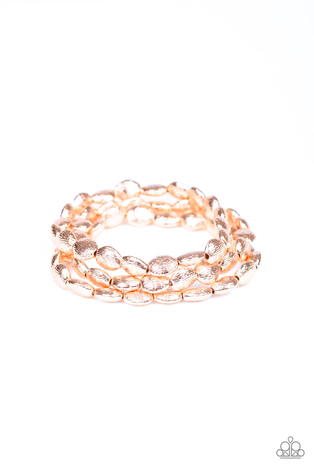 Radiating with shimmery textures, dainty rose gold beads are threaded along stretchy bands around the wrist for a casually layered look.
Sold as one set of three bracelets.