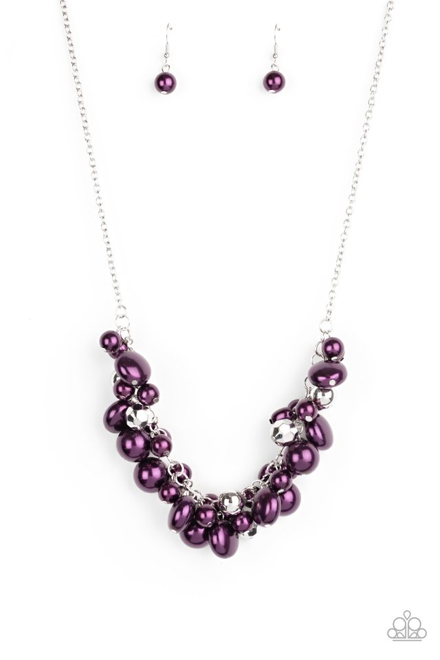 Sprinkled with faceted and shiny silver beaded accents, a bubbly collection of round, oval, and flat Magenta Purple pearls clusters below the collar for a statement-making finish. Features an adjustable clasp closure. Sold as one individual necklace. Includes one pair of matching earrings.