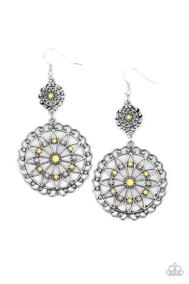 Dotted with dainty yellow and gray beads, a frilly floral frame swings from the bottom of a smaller matching frame, creating a whimsically stacked lure. Earring attaches to a standard fishhook fitting.
Sold as one pair of earrings.