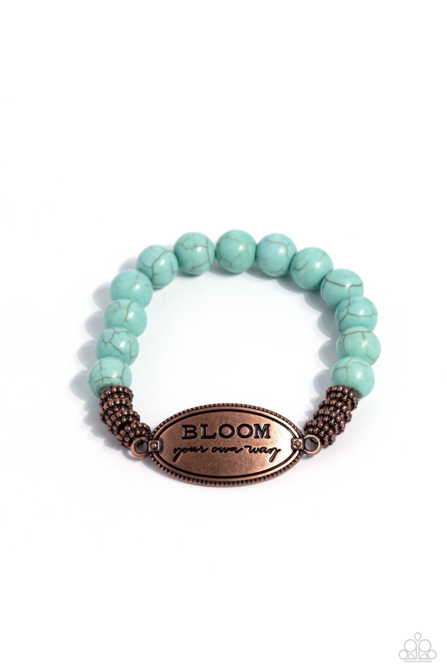 An asymmetrical, textured, copper oval pendant features the phrase "BLOOM your own way" in a variety of fonts to emphasize the inspirational message. Four textured brass wheels fan out from the pendant to a refreshing collection of turquoise stones that stretch along the wrist on an elastic stretchy band for a charming pop of color along the wrist. As the stone elements in this piece are natural, some color variation is normal. Sold as one individual bracelet.