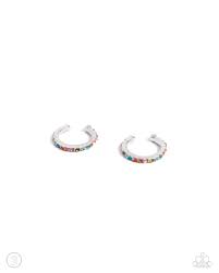 Featuring dainty multicolored rhinestones, a dainty silver cuff curls around the ear for an abstract, one-size-fits-all artful design. Sold as one pair of cuff earrings.