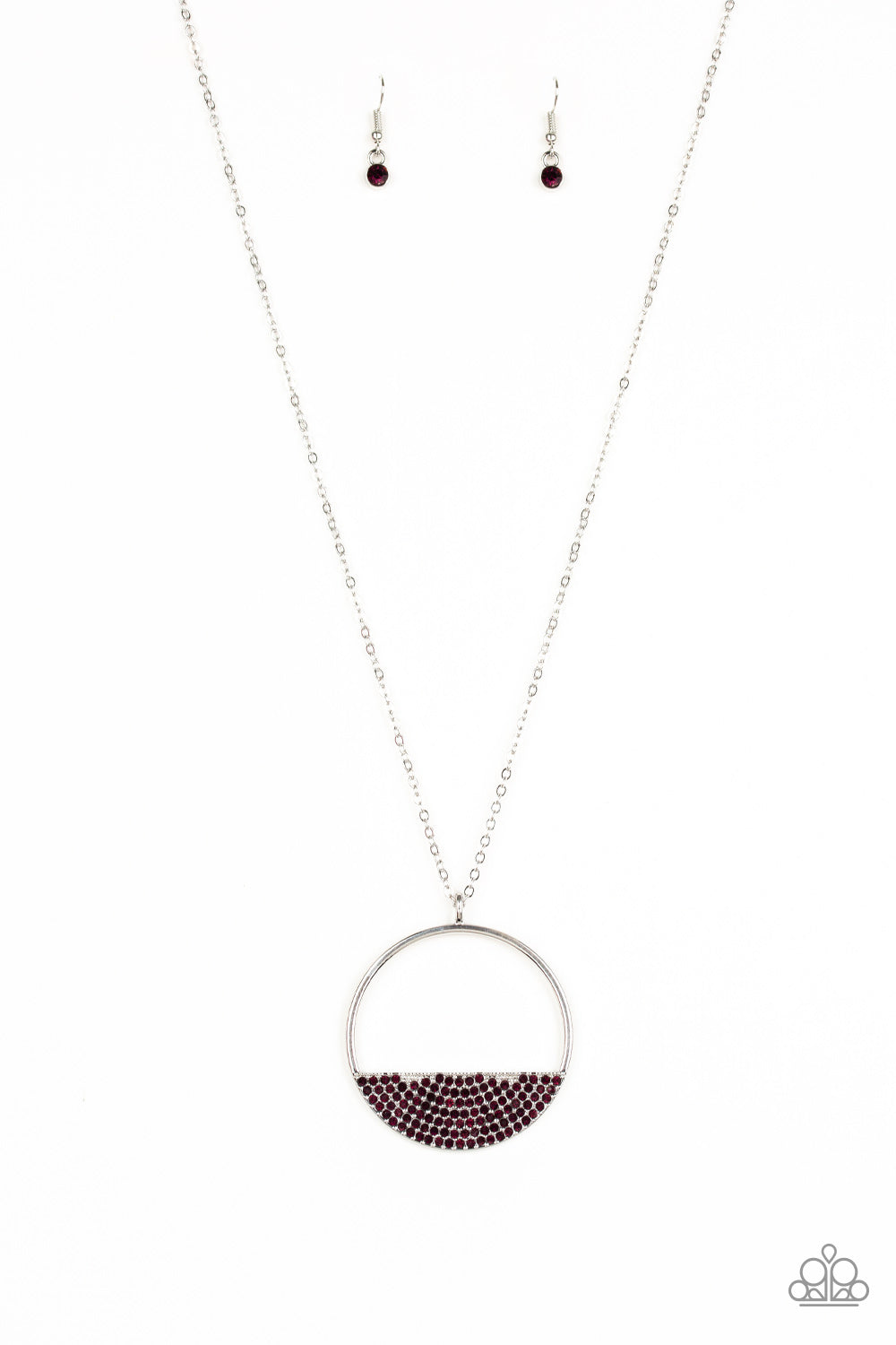 Encrusted in dainty purple rhinestones, a silver crescent frame is pressed into the bottom of an airy circular pendant for a timeless look. Features an adjustable clasp closure. Sold as one individual necklace. Includes one pair of matching earrings.